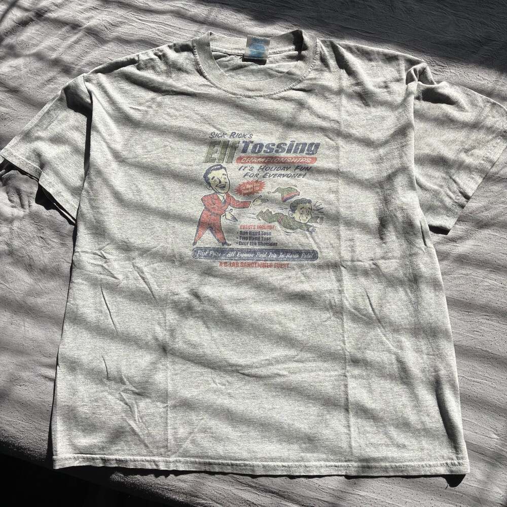 Vintage Sick Rick’s Elf Tossing Championships Graphic Funny Christmas Tee